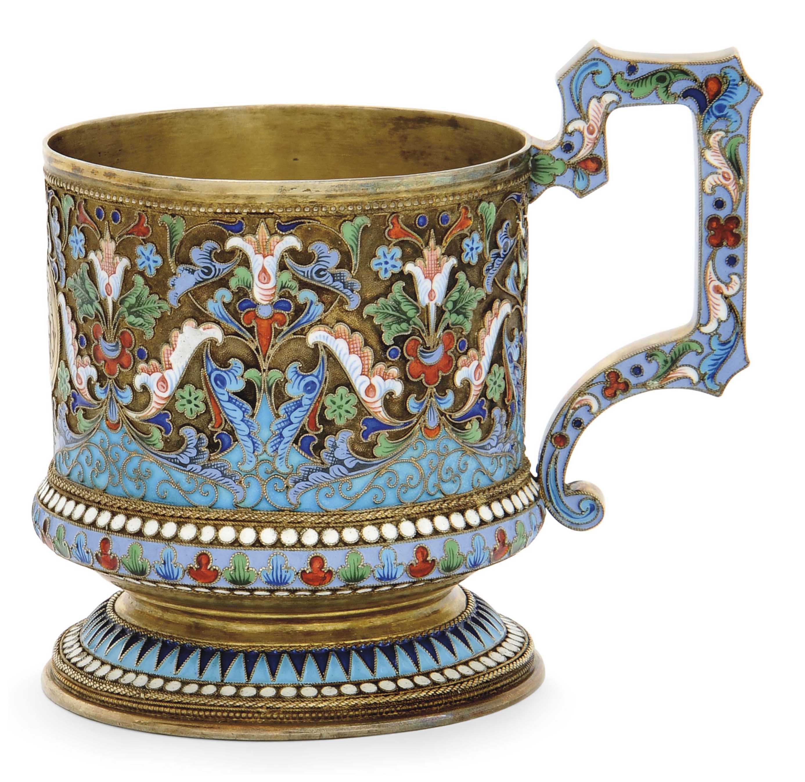 A RUSSIAN SILVERGILT AND CLOISONNE ENAMEL TEA GLASS HOLDER , MARK OF